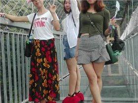 Group photo on the glass bridge of Qingyuan three day tour in 2017